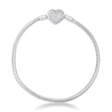 Pulseira berloques fecho coração cravejado