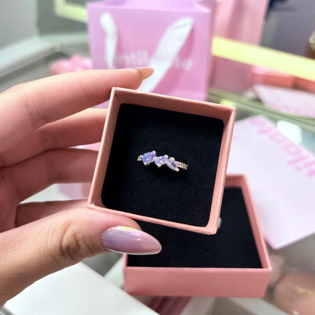 Anel zircônias gota lilás grace