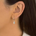 Brinco argola com zircônia oval