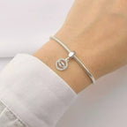 Berloque olho grego círculo cravejado